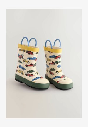 Gumové deštníkové boty s krémovým základem a barevnými vzory aut, žlutým lemem, modrými úchyty a texturovanými zelenými podrážkami pro lepší přilnavost.