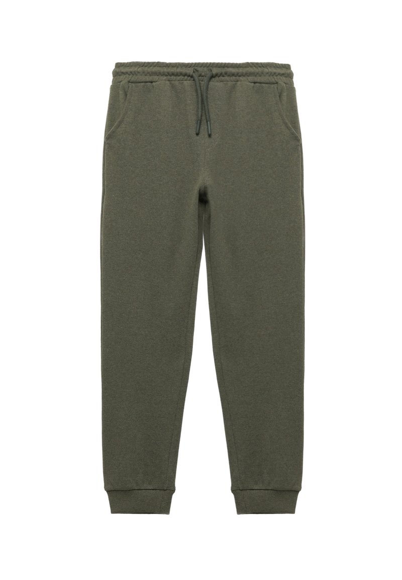 Groene joggingbroek van zacht materiaal, met zijzakken, een elastische tailleband met trekkoord en geribbelde boorden. Geen patronen of accenten.