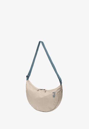 Beige schoudertas in halvemaanvorm met verstelbare teal schouderband en ritssluiting, met Jack Wolfskin-logo aan de voorkant.