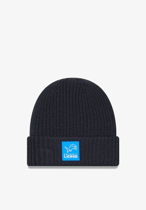 Bonnet tricoté noir avec revers avec un patch bleu affichant un logo blanc des Detroit Lions et du texte.