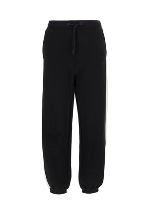 Svarta sweatpants i mjukt tyg med dragsko i midjan, smalnande muddar och vita sidostråk för kontrast. Har logodetalj.