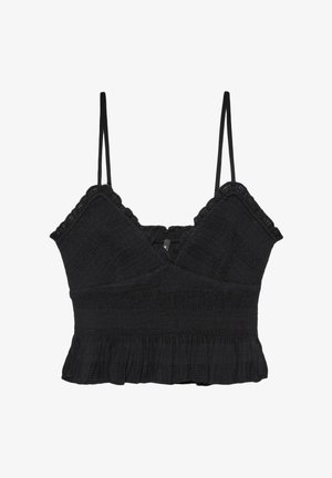 Top court noir en tissu texturé. Il possède des bretelles fines ajustables et un ourlet évasé à volants avec des détails en dentelle.