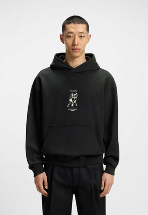Black hoodie made of cotton blend material, featuring a front kangaroo pocket and a graphic print of boxers on the chest.