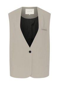 Light beige sleeveless vest made of smooth fabric. Features a single black button, two side pockets, and a striped black lining.