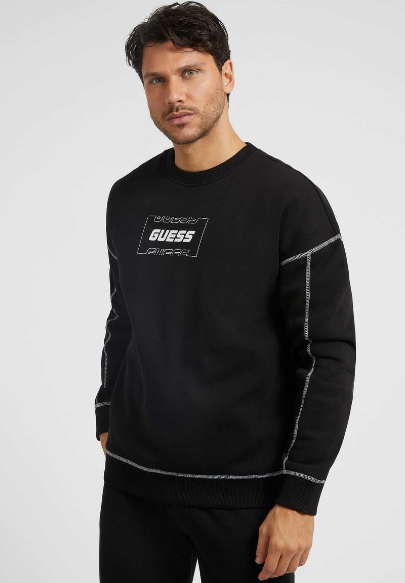 Guess FRONTLOGO Fleece jumper schwarz/black Zalando.ie