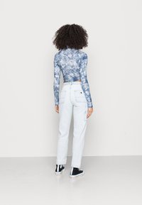 Carhartt WIP PIERCE PANT - Calças de ganga de corte relaxado - blue