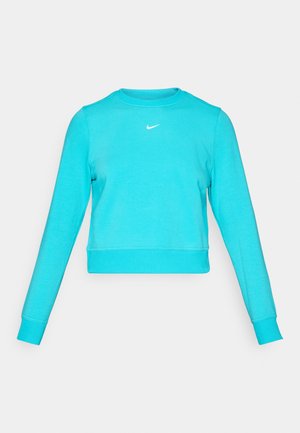 Turkise avskåret genser med lange ermer, rund hals og en liten hvit Nike-logo på brystet. Myk, strukturert stoff.