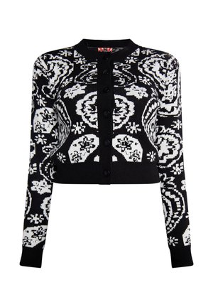 Sort og hvid mønstret cardigan med lange ærmer, knaplukning og et cropped design, der har kranium- og blomstermotiver.