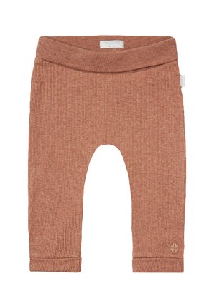 Rippstrick-Cottonleggings in Rostfarbe mit einem breiten Bund und genähten Bündchen, versehen mit einem kleinen Logodetail am Bein.