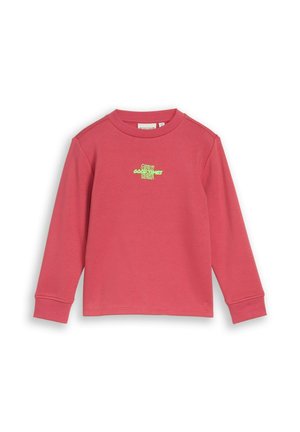 Langärmeliges pinkes Kinder-Sweatshirt mit gerippten Bündchen und kleinem grünem Textdesign auf der Brust mit dem Schriftzug "Only good vibes here".