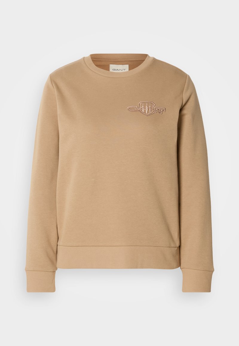 Beige Sweatshirt mit Rundhalsausschnitt, langen Ärmeln, gerippten Bündchen und Saum sowie kleinem gesticktem GANT-Logo auf der linken Brust.