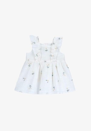 Vestido blanco sin mangas con bordado floral verde, que presenta tirantes con volantes y cintura fruncida. Fabricado en tejido ligero y texturizado.