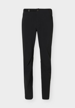 Pantalon noir coupe slim avec boucle de taille ajustable, fermeture par bouton, poches avant zippées et poche latérale zippée sur fond blanc.