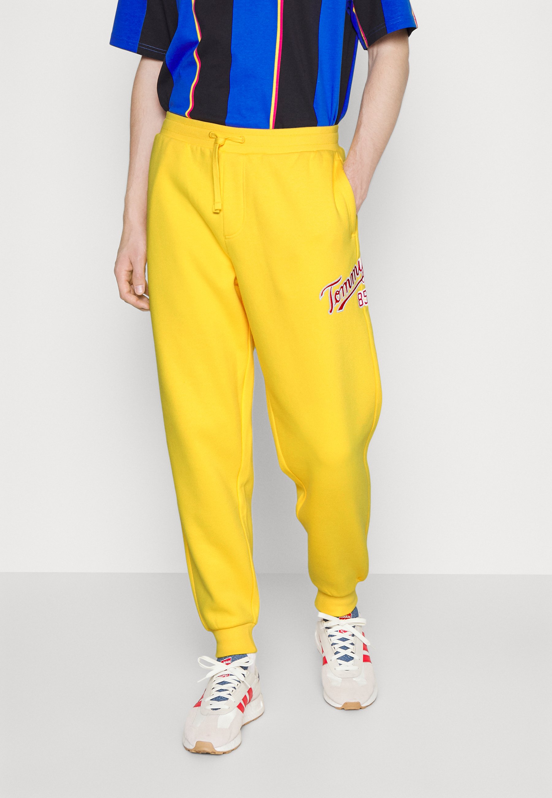 Tommy Jeans COLLEGE Pantalones deportivos warm yellow amarillo Zalando.es