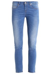 Light blue denim jeans with a slim fit, featuring five pockets, a zip fly, and subtle fading for a casual look.