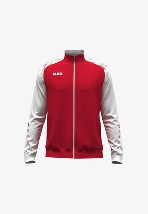 Rood-witte sportjas met rits en hoge kraag, met het merk JAKO op de borst, patroon op de schouders en zakken aan de voorkant.