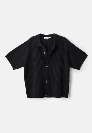 Black knitted short-sleeve cardigan with a collared neck, featuring vertical ribbed texture and brown button accents.