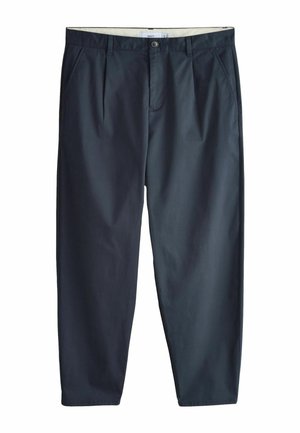 Navy blue men's trousers with belt loops, front pleats, slant pockets, button and zip closure, displayed against white background.