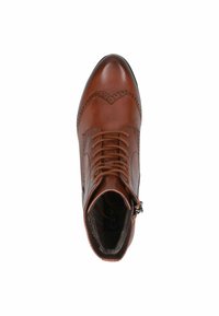 Bottine en cuir marron avec un bout arrondi, lacets sur le devant, détails de brogue décoratifs, fermeture éclair sur le côté et doublure intérieure douce.