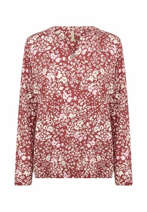 Top met lange mouwen gemaakt van stof met een bordeauxrode basis, voorzien van een verspreid bloemenpatroon in zachte roze- en wittonen. V-hals.