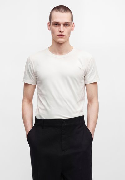 Han Kjøbenhavn WIDE LEG - Pantalon classique - black
