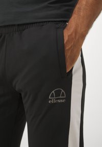 Ellesse UNASTAN PANT - Træningsbukser - black