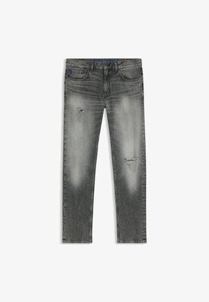 Gray denim jeans with a straight-leg fit. Features distressed patches, subtle fading, and five-pocket design. Top stitched waistband.