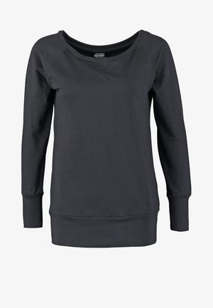 Mustmust pikkade varrukatega särk laia kaelusega ja soonikute ääristusega. Valmistatud pehmest materjalist, millel on veidi lõtv istuvus ja sirge äär.