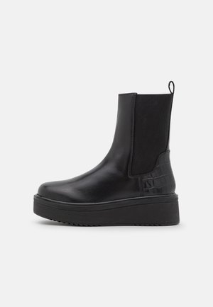 Enkellaarsjes met plateauzool - black