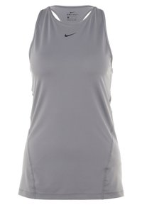 Grå Nike Dri-FIT linne med ärmlös design, rund halsringning och subtilt texturerad tyg. Har en liten svart logotyp på framsidan.
