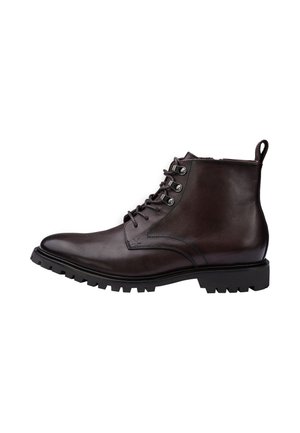 Dark brown leather ankle boot with lace-up front, metal eyelets, pull tab at heel, and thick rubber lug sole.