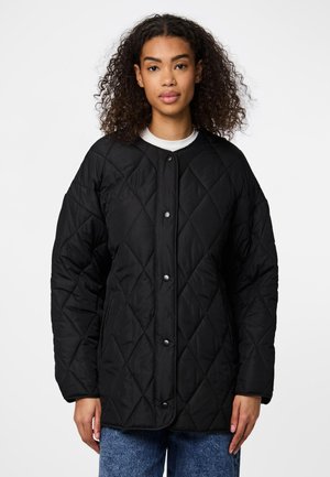 Black quilted jacket with a round neckline, snap button closure, and oversized sleeves; features a smooth fabric texture and diamond pattern.