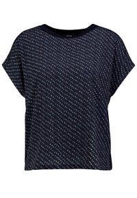 Marinblå kortärmad blus i lätt material. Har ett diagonalt blommönster i vitt och rosa, rundad halsringning och lös passform.