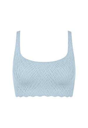 Lyseblå sømløs bh med brede stropper og et diskret teksturmønster over stoffet.