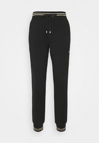 Svarte joggingbukser med elastisk taljebånd med gyldne striber, snøre-lukning og ribbede manchetter. Glat stof, konisk pasform.