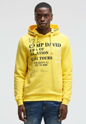 MIT PUFFPRINT - Hoodie - yellow sun