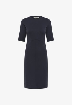 Morska plava haljina s kratkim rukavima, okruglim izrezom i prilagođenim siluetom. Izrađena od glatkog materijala, s suptilnim detaljima šavova.