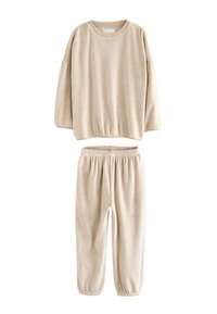 Set di abbigliamento lounge color beige chiaro, a coste, composto da una maglia a maniche lunghe ampia con elastico e pantaloni affusolati abbinati con polsini e vita elasticizzati.