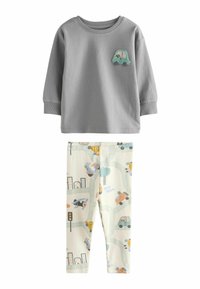 Gray long-sleeve shirt with a car patch, paired with light-colored leggings featuring a playful traffic-themed print. Soft cotton fabric.