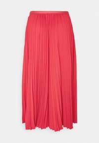 Pleated coral skirt featuring a wide waistband, flowing shape, and soft texture, falling to mid-calf length with consistent pleats.