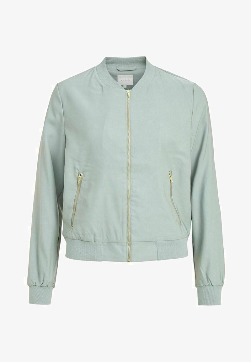 Veste bomber vert clair avec col, poignets et ourlet côtelés, fermeture éclair avant et deux poches latérales zippées, présentée sur un fond blanc.