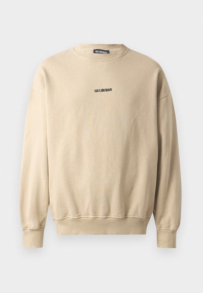 Beige sweatshirt lavet af bomuld. Har rund hals og lange ærmer. Lidt sort tekst i midten siger "Han Kjobenhavn."