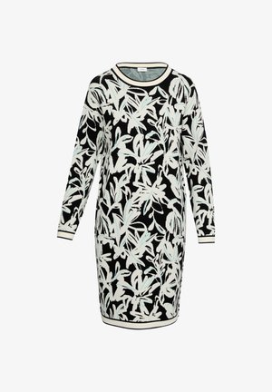 Vestido de punto con base negra y patrones florales en blanco y azul claro, mangas largas y un escote y dobladillo de contraste.