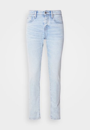 Light blue denim jeans with a slim fit, five-pocket design, and a button closure. Features slight fading and straight leg cut.