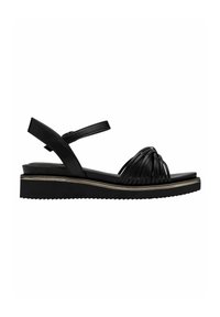 Svarta lädersandaler med en flätad remdesign, justerbar ankelrem och en låg kilklack med en texturerad botten.