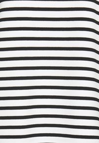 Black and white striped fabric displaying even horizontal lines. The texture appears smooth, with no noticeable patterns or embellishments.