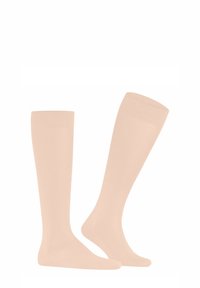 Calze beige fino al ginocchio realizzate in materiale liscio ed elastico; presentano una punta chiusa e una fascia a coste per una vestibilità sicura.