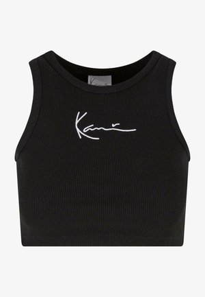 Melna ribota īsā topa blūze ar noapaļotu kakla izgriezumu un baltu skriptu logotipu. Tam ir bez piedurknēm dizains un pieguļošs siluets.