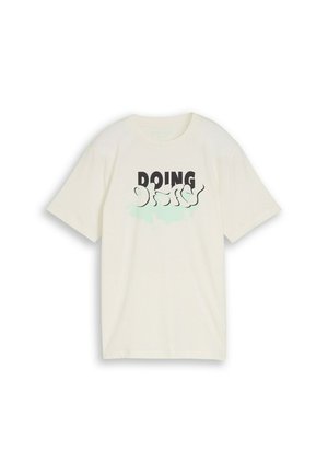 Cream-colored short-sleeve t-shirt with black and light blue text design saying "DOING" in bold and abstract font on the front.