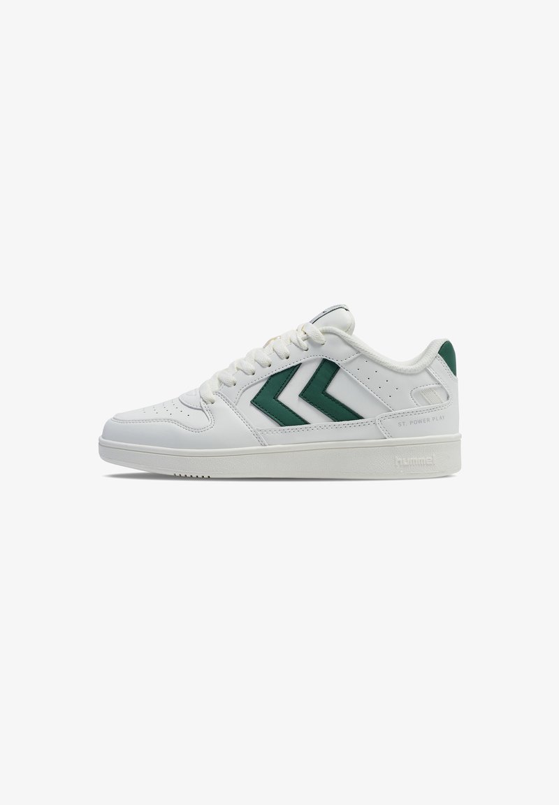 White sneakers with green chevron accents, leather upper, flat sole, perforated toe box, and branded heel with "ST. POWER PLAY."